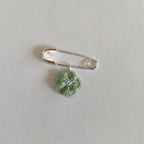 Broche rêveuse